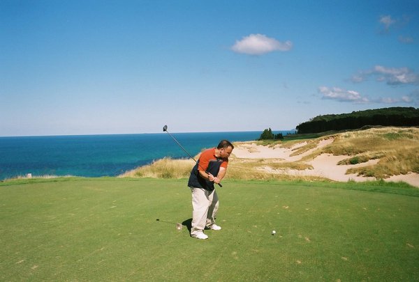 Me golfing by Lake Michigan