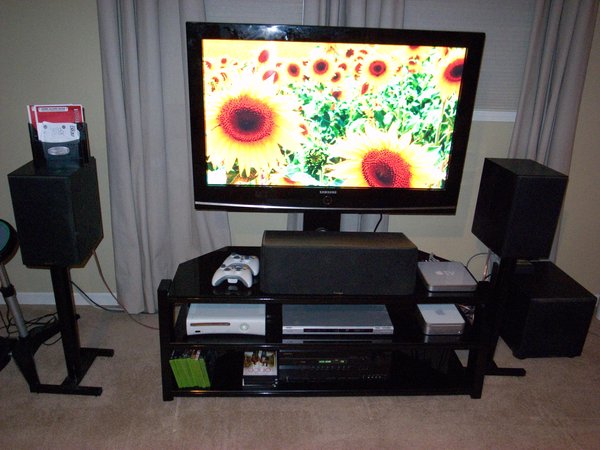My entertainment center with XBox, Mac Mini, Apple TV and speakers